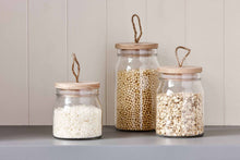 Load image into Gallery viewer, DAVIS &amp; WADDELL - ROUND GLASS STORAGE CANISTER - WITH WOODEN LID - 3 PIECE SET
